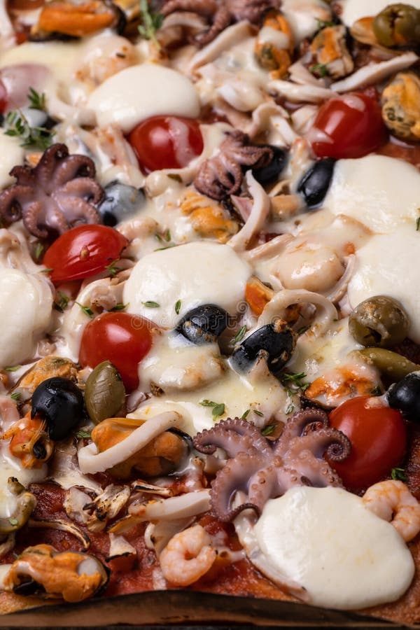 rectangular-homemade-seafood-pizza-octopus-shrimp-mussels-squid-close-up-top-view-rectangular-...jpg